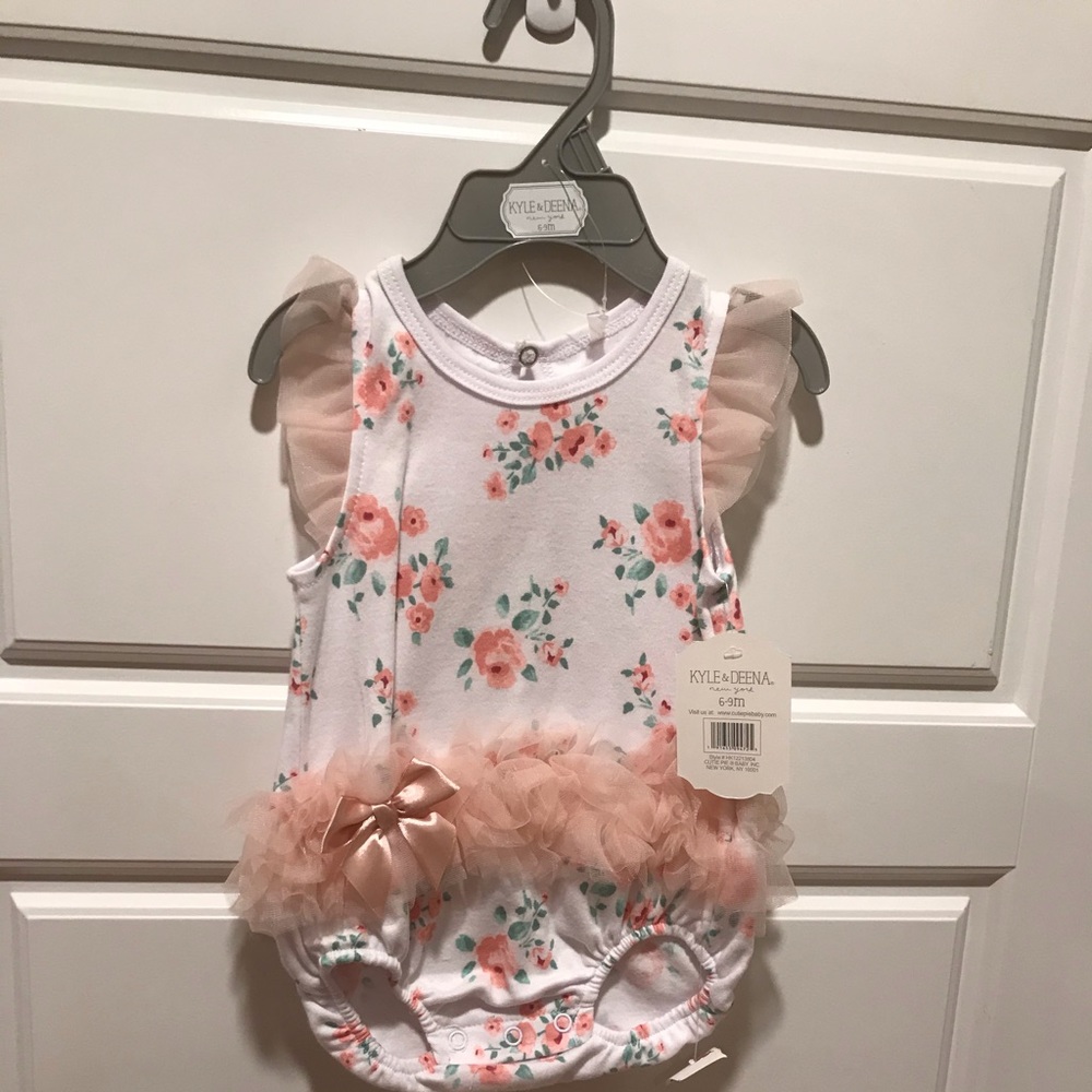 Cute floral onesie with tutu and bow
